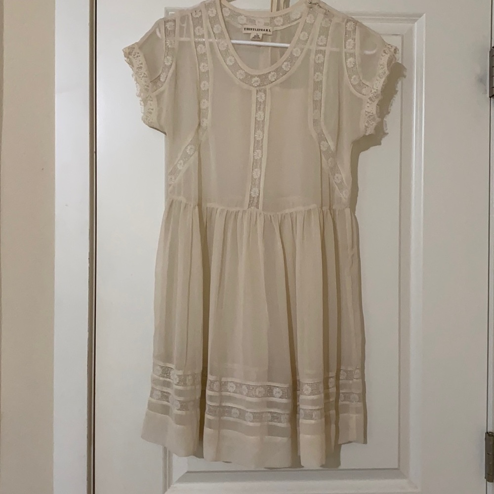Cream lace babydoll dress. Very dainty. Lots of detail. Size small.